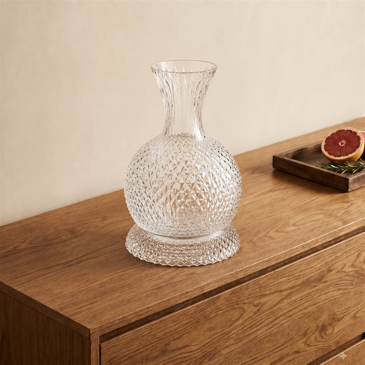 Elevate your home bar with this 360° Spinning Crystal Decanter. Built with a precision-balanced curved bottom and a matching diamond-faceted pedestal base, this decanter glides into a smooth rotation with a light nudge, naturally aerating your favourite spirits while reflecting ambient light through deep crystal facets.
