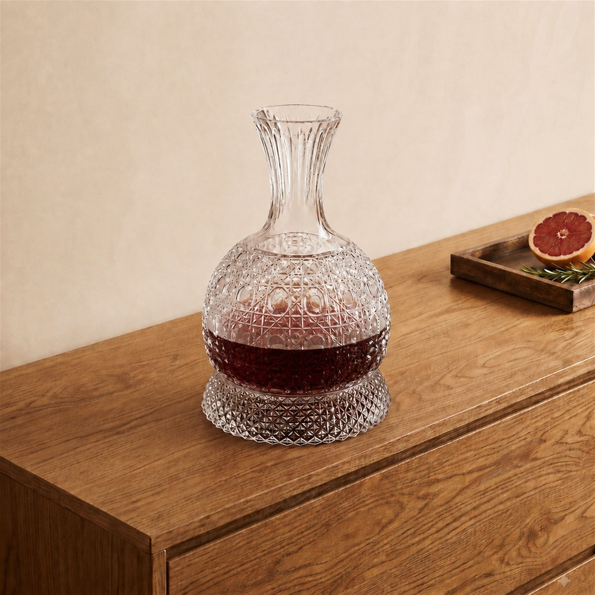 Elevate your home bar with this 360° Spinning Crystal Decanter. Built with a precision-balanced curved bottom and a matching diamond-faceted pedestal base, this decanter glides into a smooth rotation with a light nudge, naturally aerating your favourite spirits while reflecting ambient light through deep crystal facets.