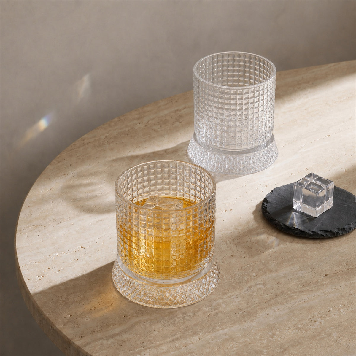Bring motion to your bar with Spinning Whisky Glasses. Built with a curved bottom and paired with matching faceted bases, each 280ml glass rotates 360 degrees to aerate your drink and unlock deeper aromas.